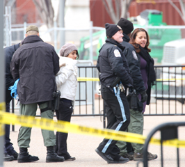 Judith Nieto, in white jacket, is arrested in front of the White House on Feb. 13. Photo: Javier Sierra.