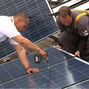 Installing Solar Rooftop solar panel installation in California (Photo: Sierra Club) 