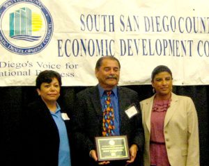 Outstanding Corporate Citizen Award - (L to R: South County EDC President Rosa Lopez-Gonzalez, Dukie Valderama, Ileana Ovalle of Cox Communications