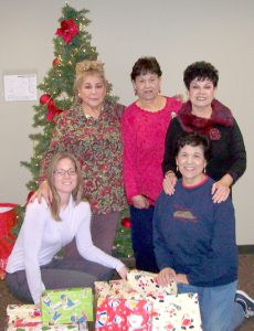 adopt a family vfw ladies aux 001 Left to right: Barbara Fink, Family Health Center of San Diego; Auxiliary member, Carmen Gomez, Youth Activity Chairman, Marcella Smith, Chaplain-Holiday Chairman, Olivia J. DeLaRosa-Solomon; Mercy Gastelum, Community Services.