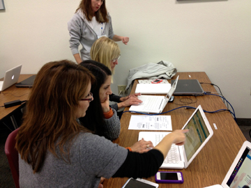 EdTech2U parents checking out computer related technologies.