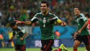 Mexico's defender Rafael Marquez celebrates after scoring during a Group A football match between Croatia and Mexico at the Pernambuco Arena in Recife during the 2014 FIFA World Cup on June 23, 2014. AFP PHOTO / YURI CORTEZ